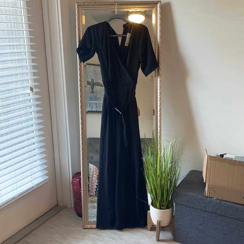 Black full pant length romper with statement belt